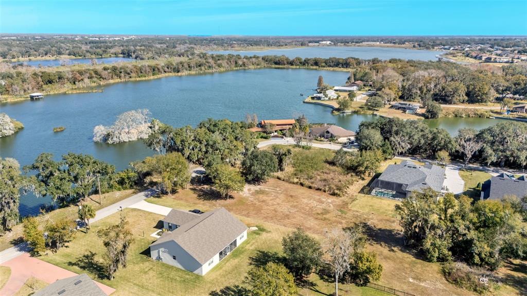 2577 Rogers Road Lakeland, FL 33812 - Photo 5 of 8 an aerial view of a house with a lake view