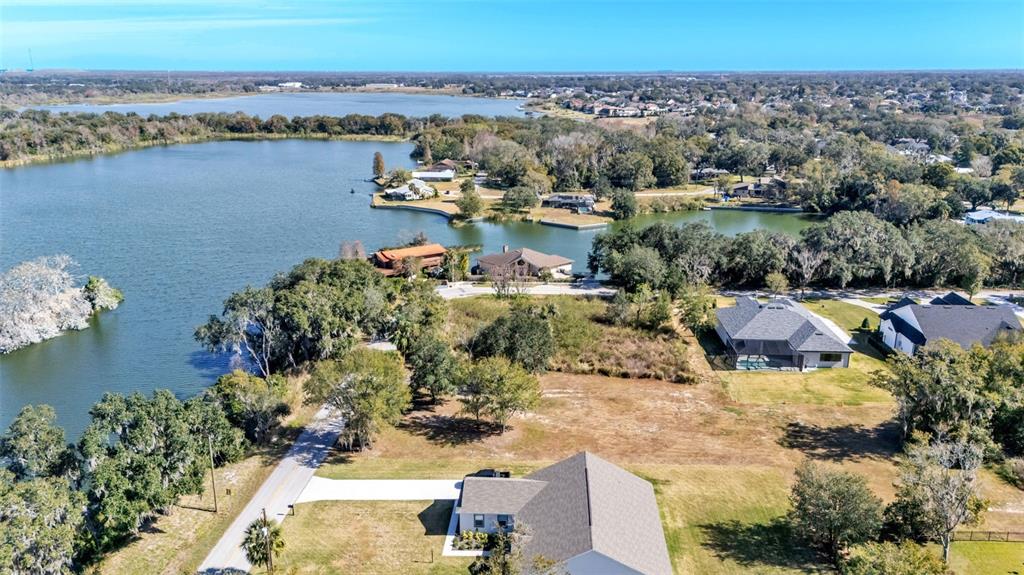 2577 Rogers Road Lakeland, FL 33812 - Photo 6 of 8 an aerial view of a house with a lake view