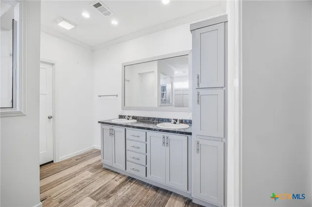 a bedroom with bed and window