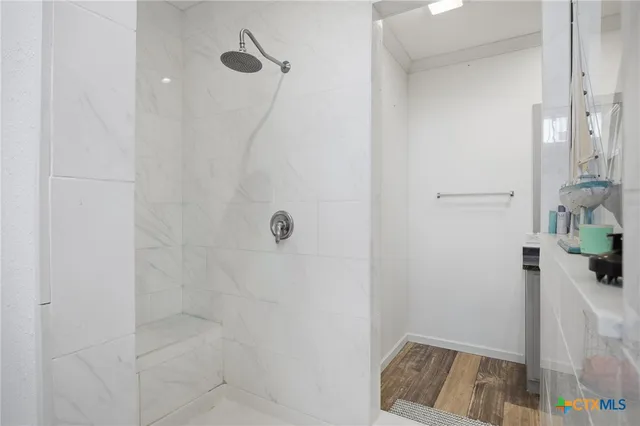 a utility room with sink dryer and washer