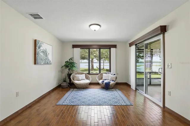 a kitchen with a refrigerator and a sink