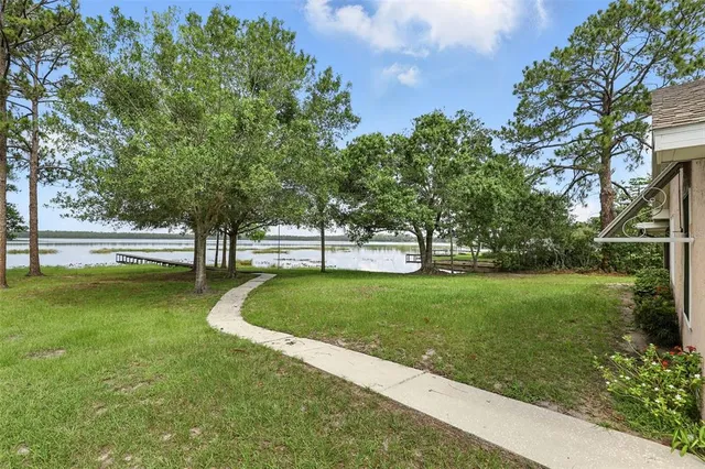 a lake view with a fountain