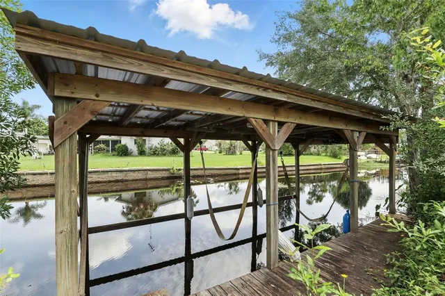a sitting area with furniture and a yard