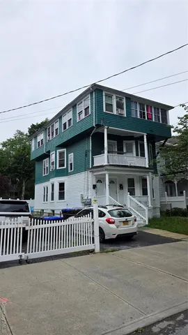 front view of a building with a street