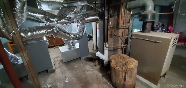 a view of a room with entryway furniture and front door