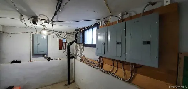 a view of a room with wooden walls