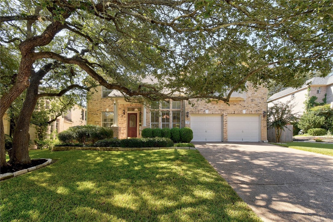 Restricted Address Austin, TX 78732 - Photo 1 of 1 a front view of a house with a yard and trees