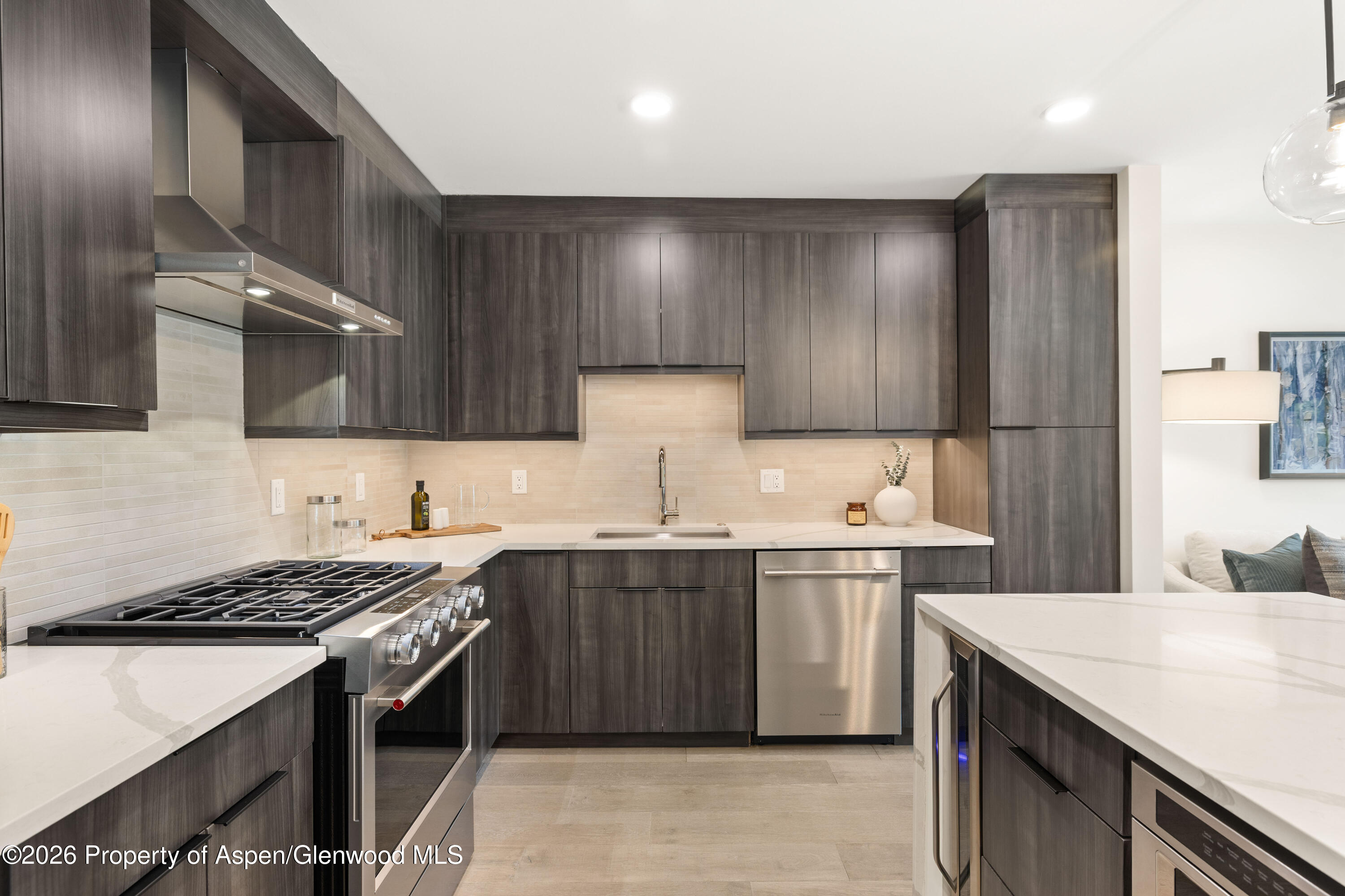 85 Kodiak Drive, Unit 320 Basalt, CO 81621 - Photo 6 of 20 a kitchen with a sink a stove and cabinets