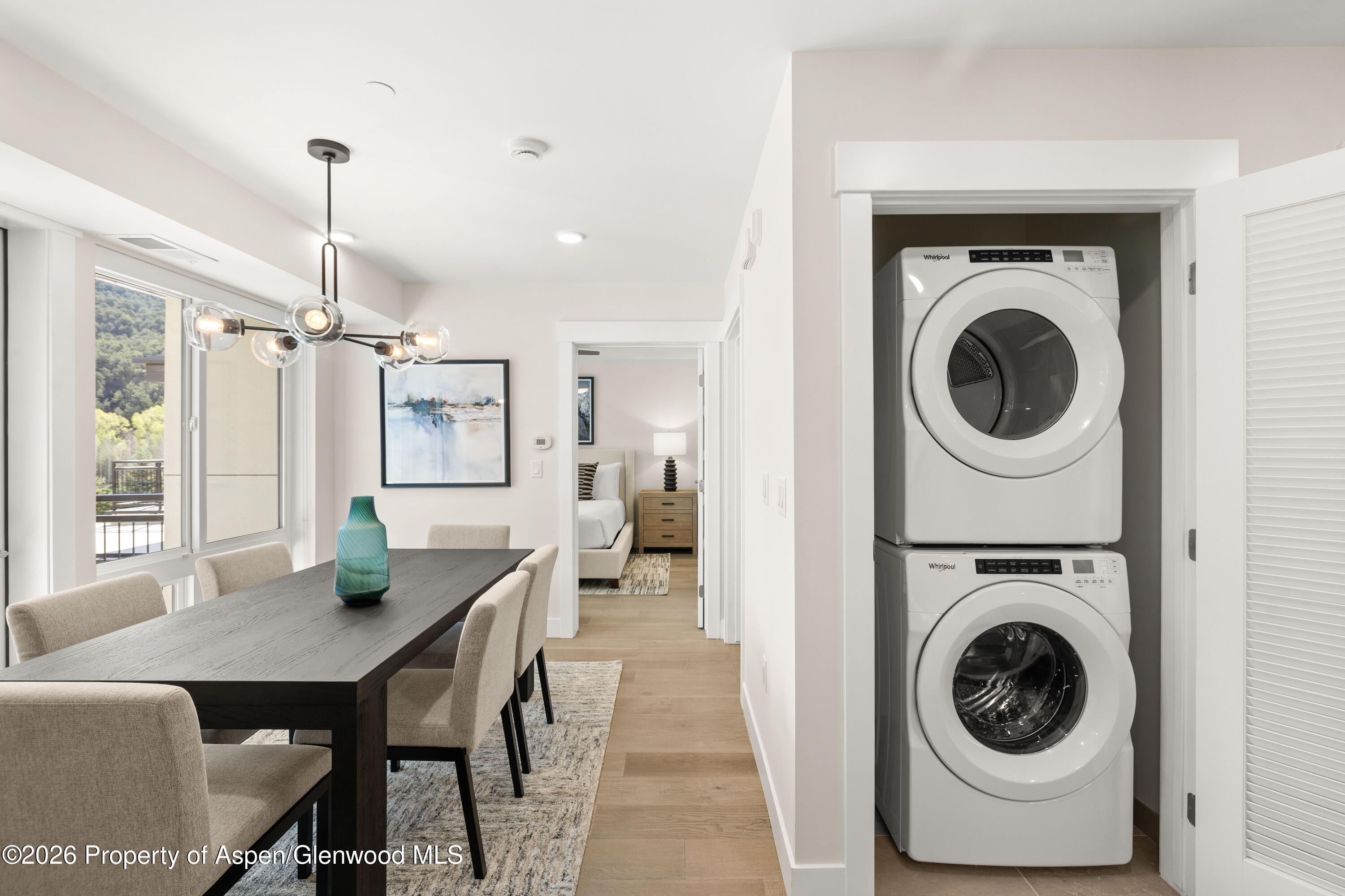85 Kodiak Drive, Unit 320 Basalt, CO 81621 - Photo 8 of 20 a view of a hallway with washer and dryer