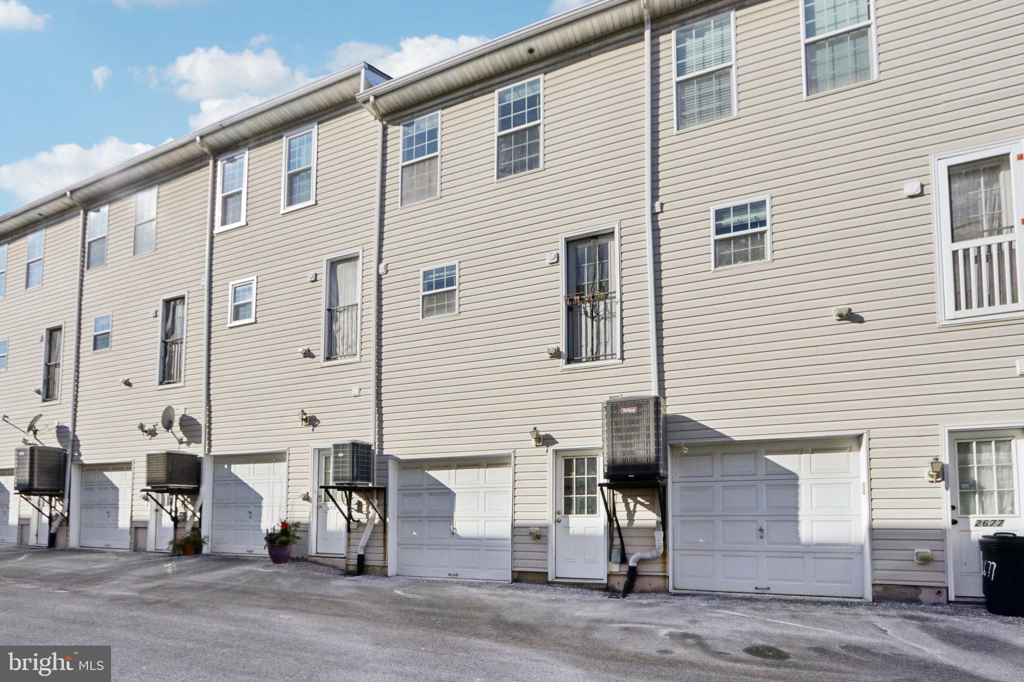 2675 Edgemont Street Philadelphia, PA 19125 - Photo 17 of 18 a view of a house with a small yard