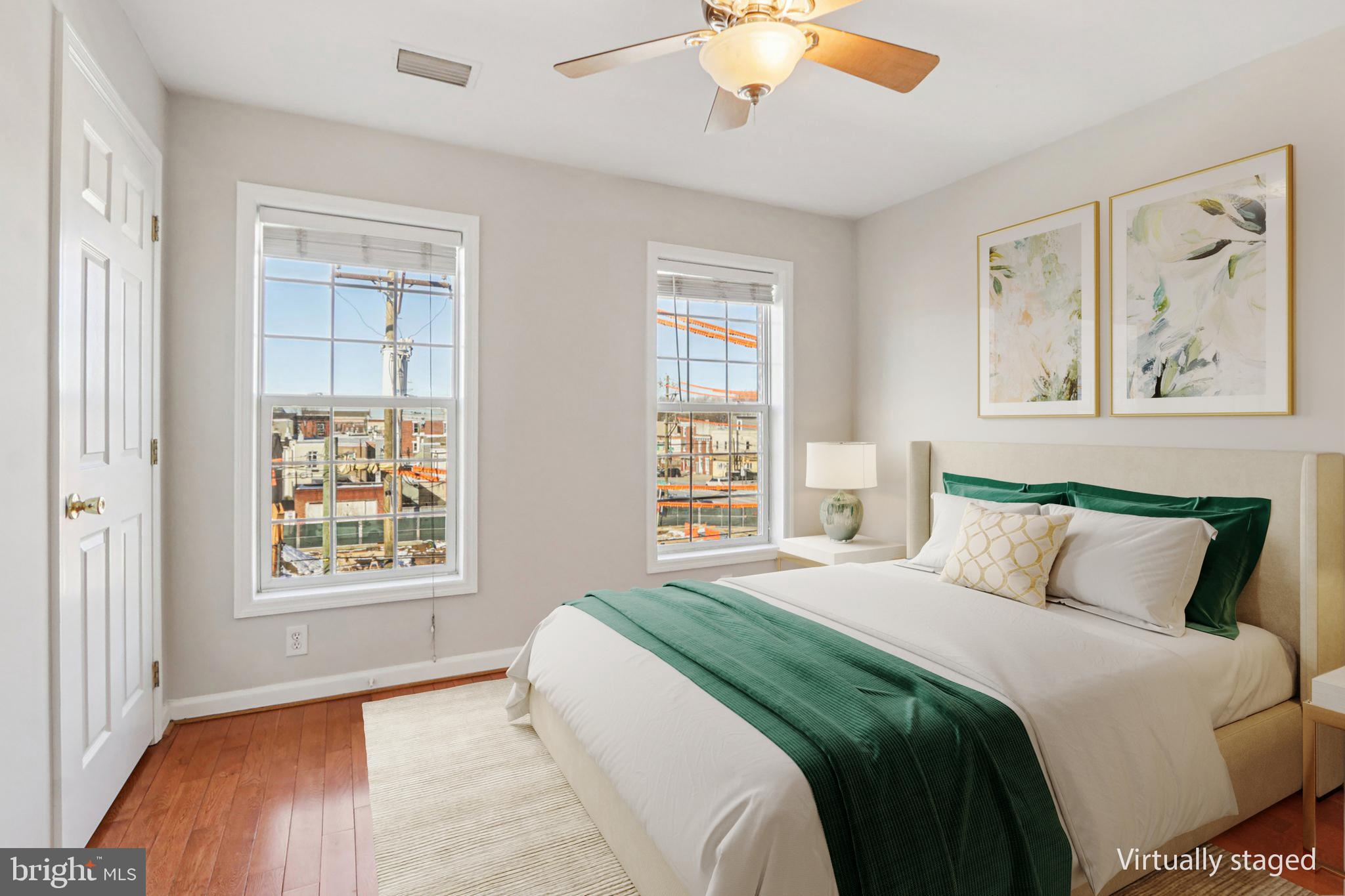 2675 Edgemont Street Philadelphia, PA 19125 - Photo 8 of 18 a bedroom with a large bed and a window