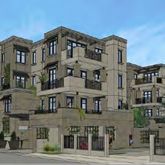 a front view of a building with a street