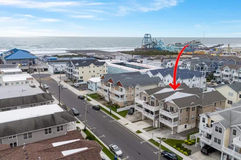 an aerial view of a building with outdoor space