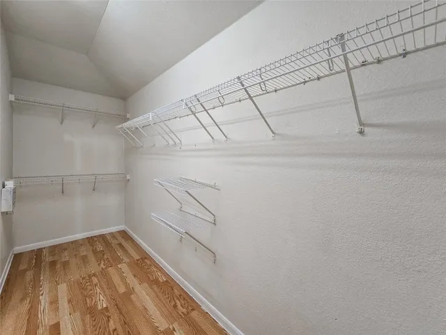 a view of a room with racks on the wall