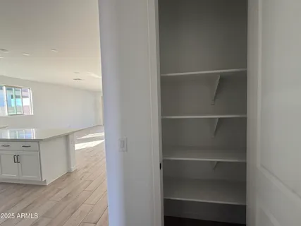 a view of a room with rack on the wall