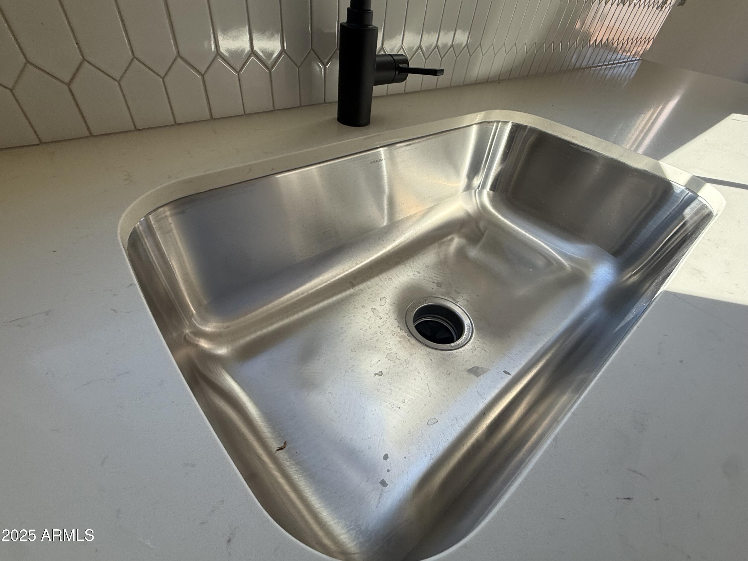 9620 West Tamarisk Avenue Tolleson, AZ 85353 - Photo 15 of 32 a close view of sink