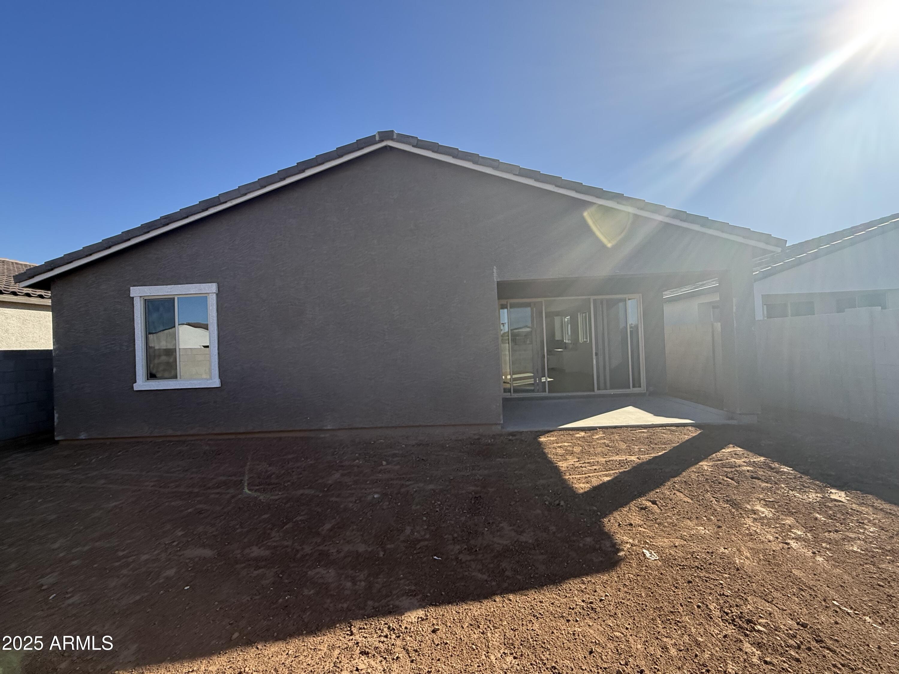 9620 West Tamarisk Avenue Tolleson, AZ 85353 - Photo 21 of 32 a backyard of a house
