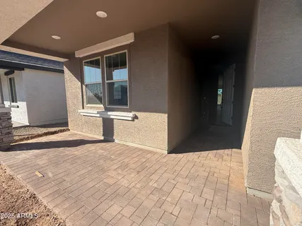 a view of a back yard of the house