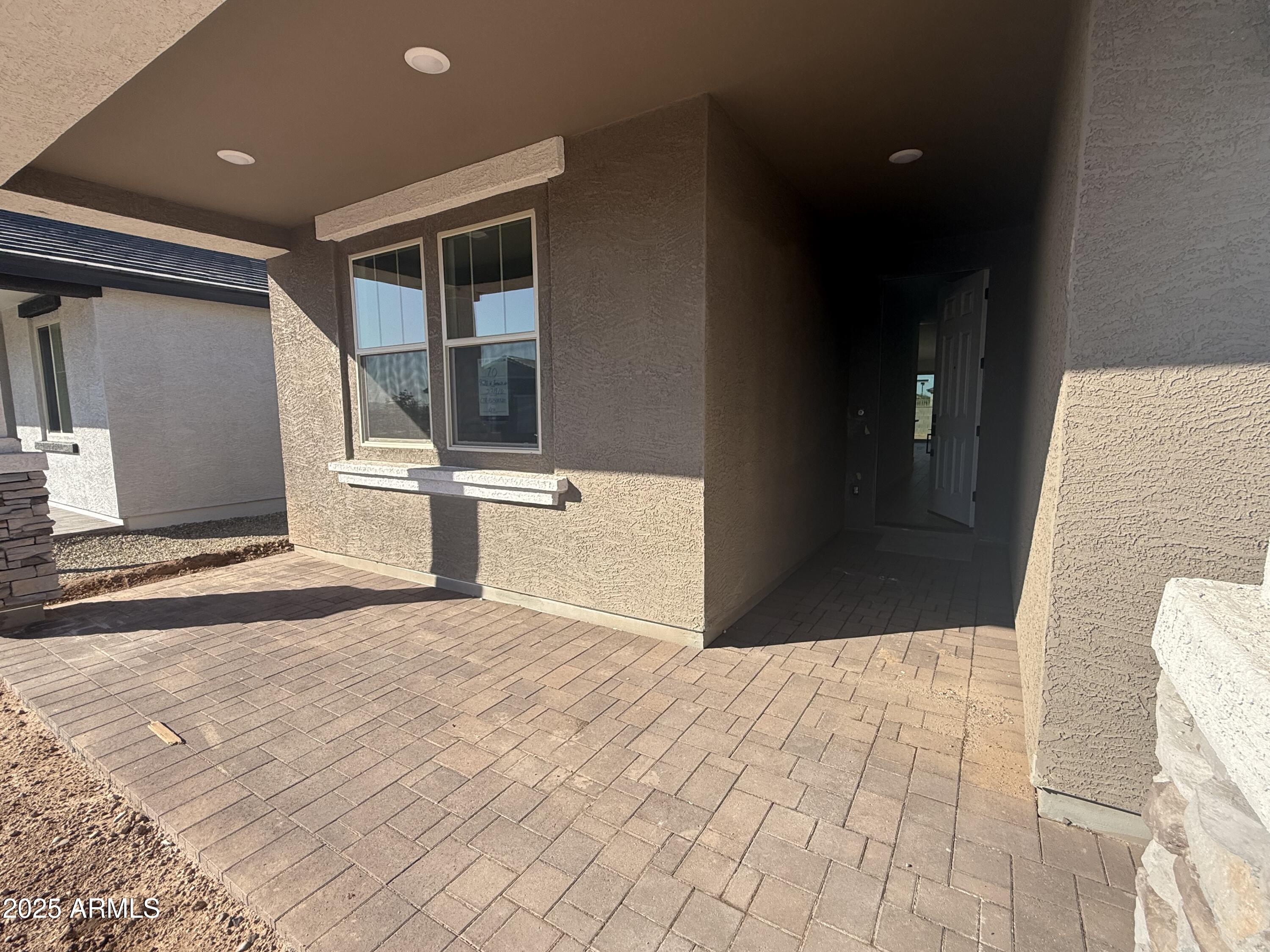 9620 West Tamarisk Avenue Tolleson, AZ 85353 - Photo 3 of 32 a view of a back yard of the house