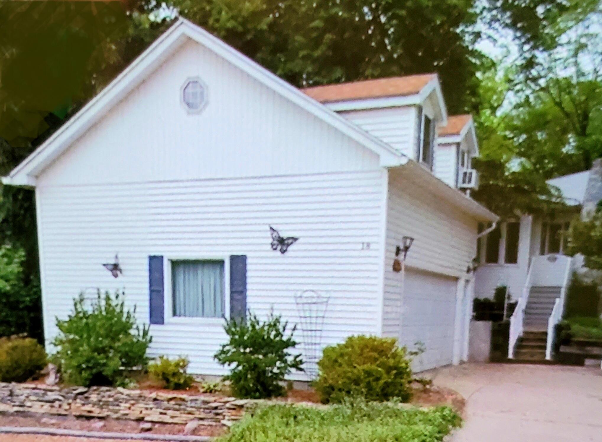 18 Diana Road Ogden Dunes, IN 46368 - Photo 11 of 13 a view of a house with a yard