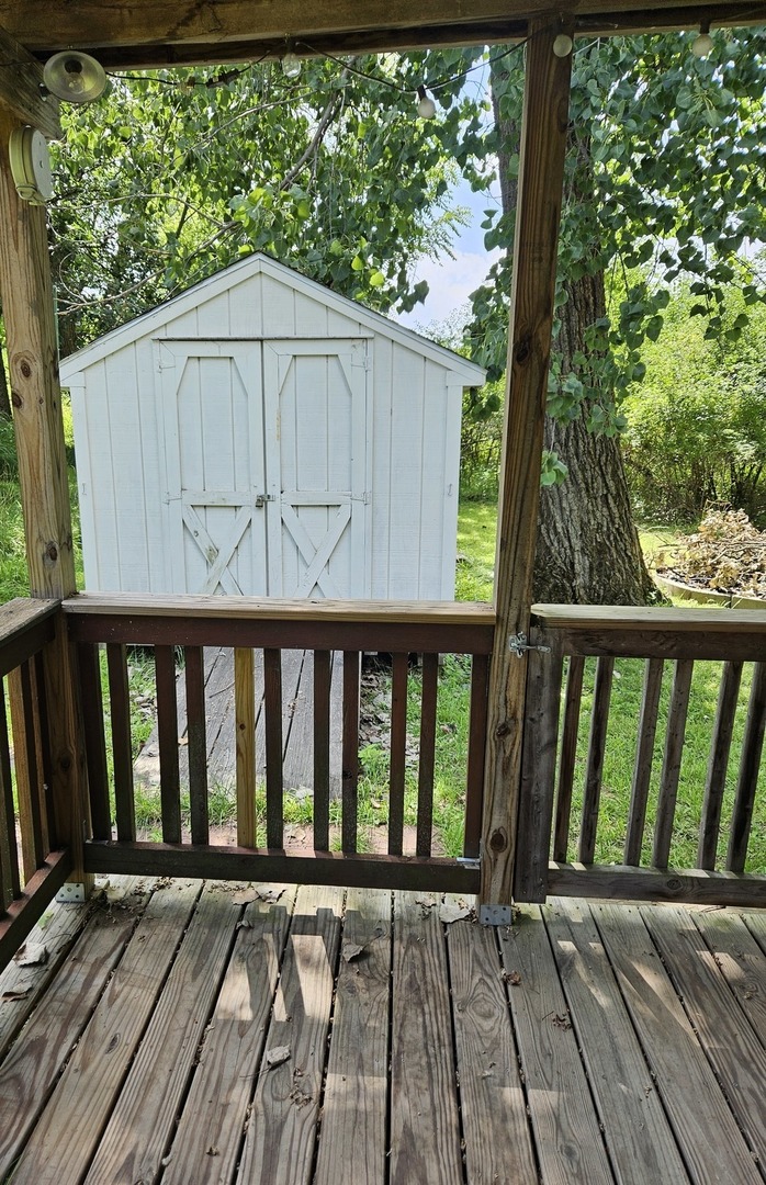 25-37 Woodhaven Sublette, IL 61367 - Photo 12 of 13 a view of wooden balcony with wooden floor
