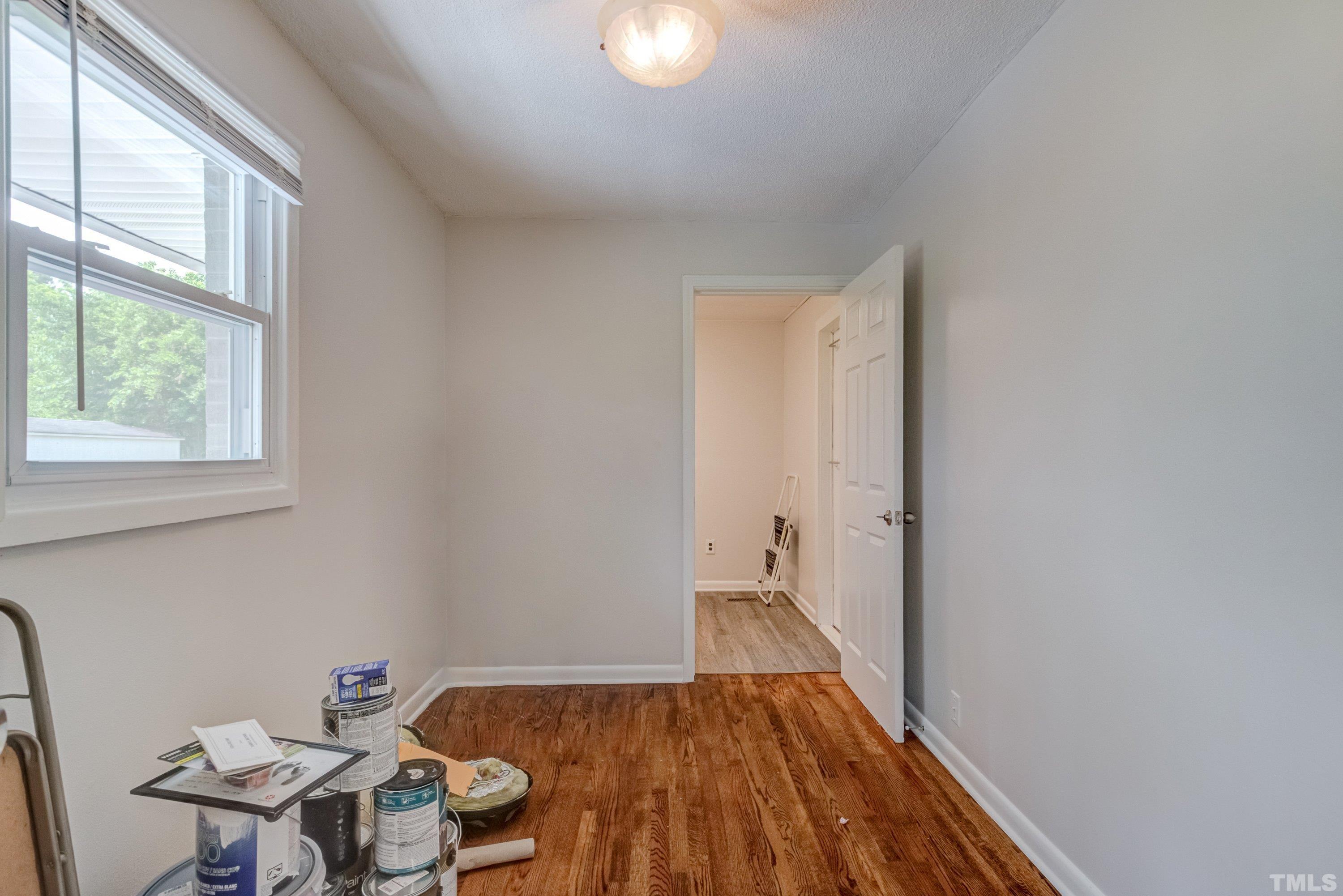 3840 Marsh Creek Road Raleigh, NC 27604 - Photo 31 of 41 a very nice looking room with wooden floor and a window