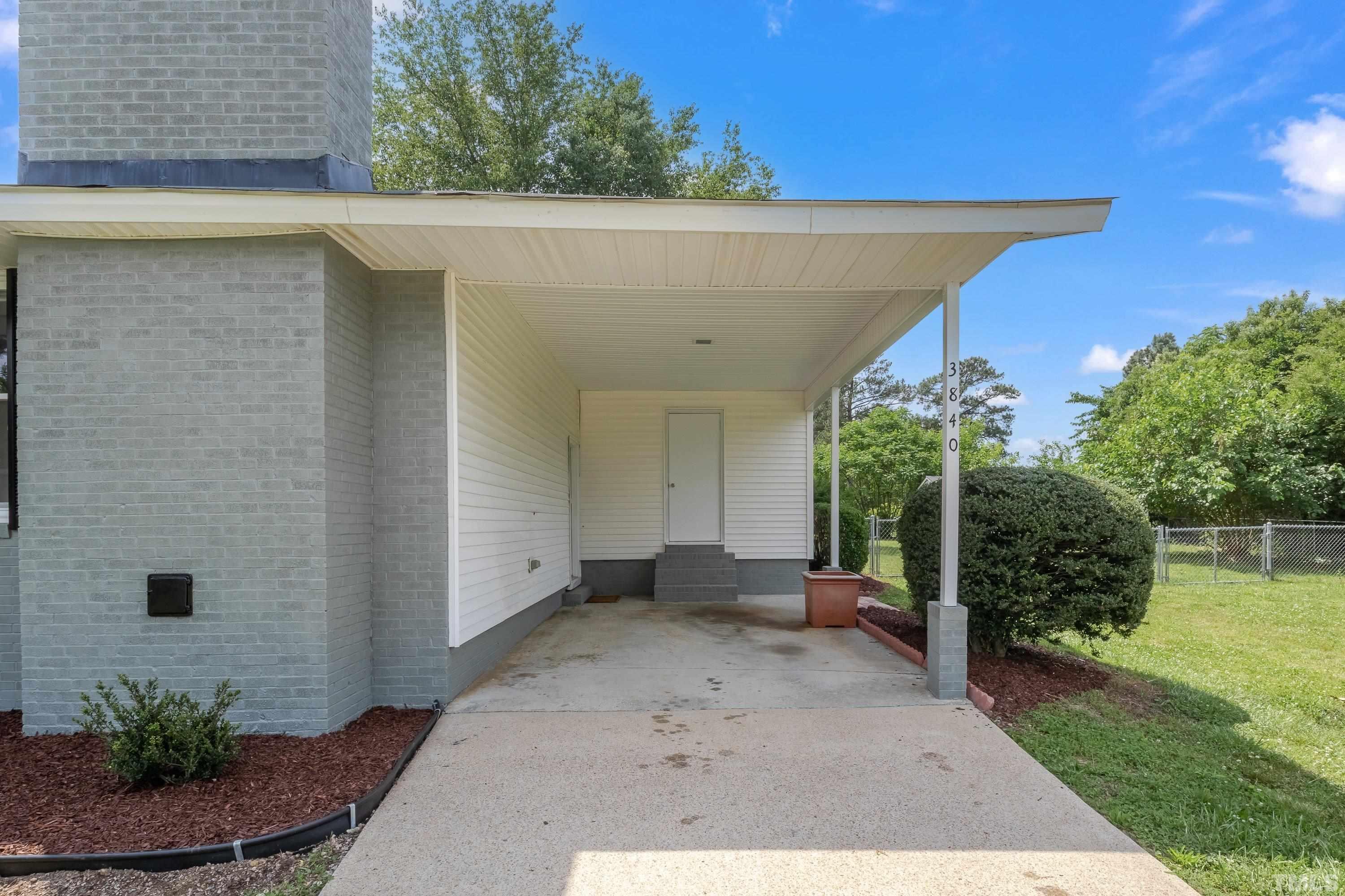 3840 Marsh Creek Road Raleigh, NC 27604 - Photo 5 of 41 a view of a porch