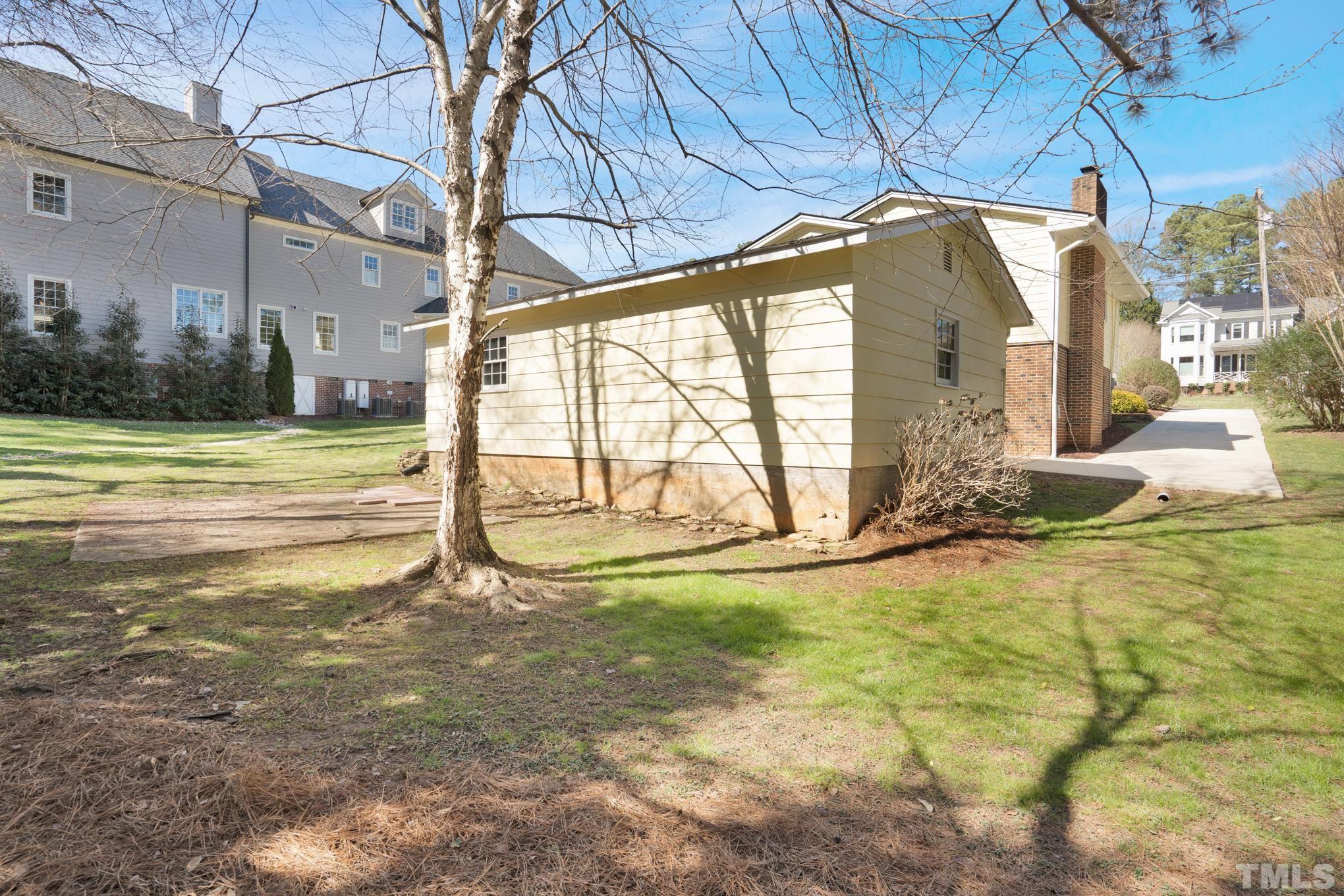 3321 Harden Road Raleigh, NC 27607 - Photo 13 of 26 a view of a house with a yard