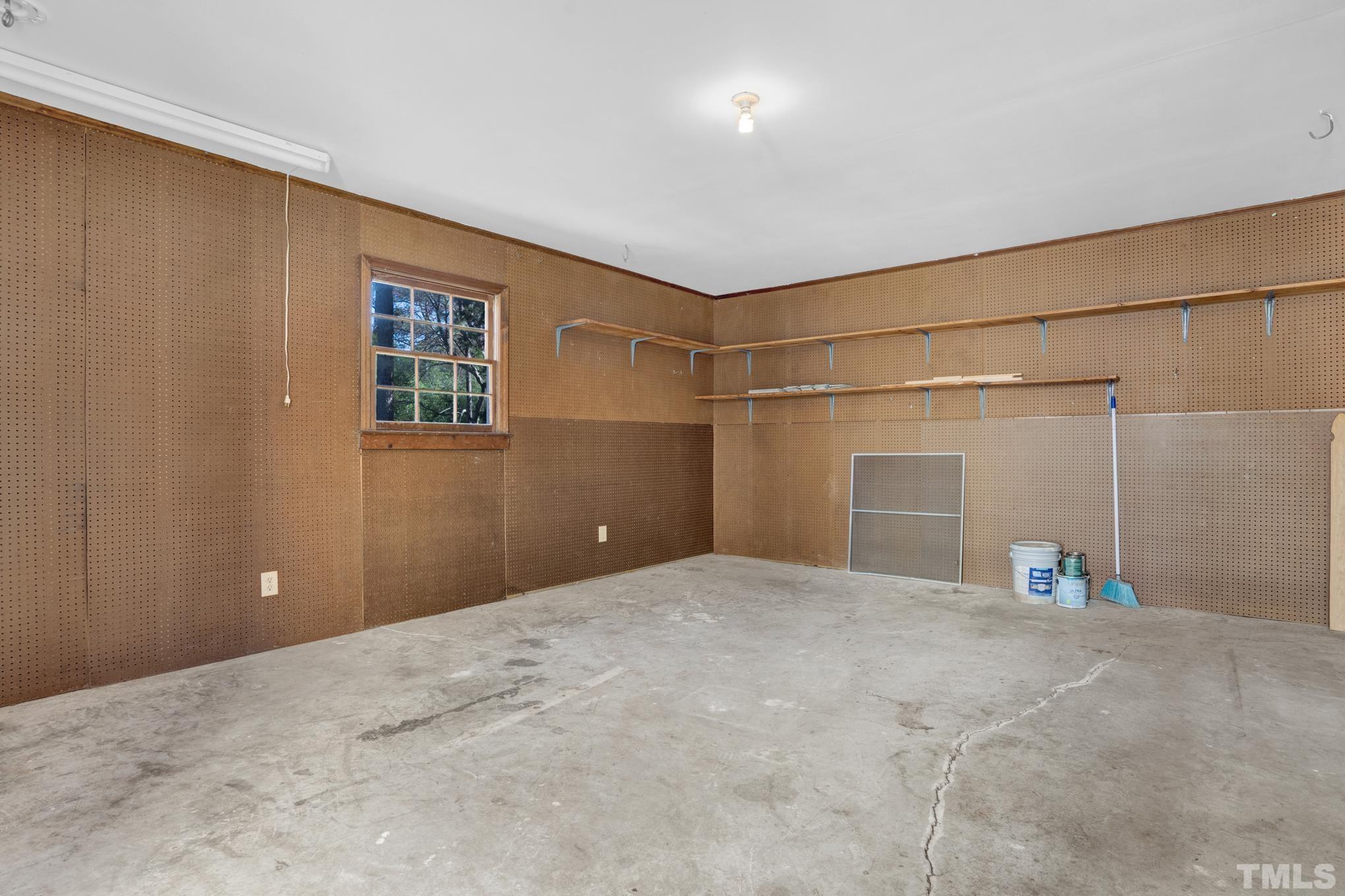 3321 Harden Road Raleigh, NC 27607 - Photo 15 of 26 a view of a livingroom with a garage