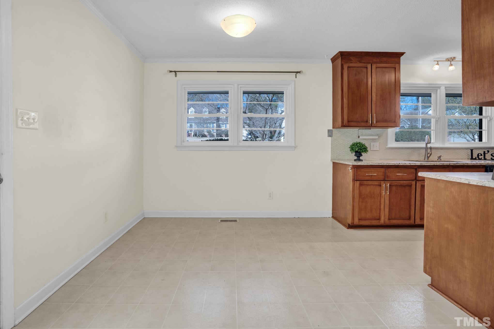 3321 Harden Road Raleigh, NC 27607 - Photo 19 of 26 a view of a kitchen with a sink