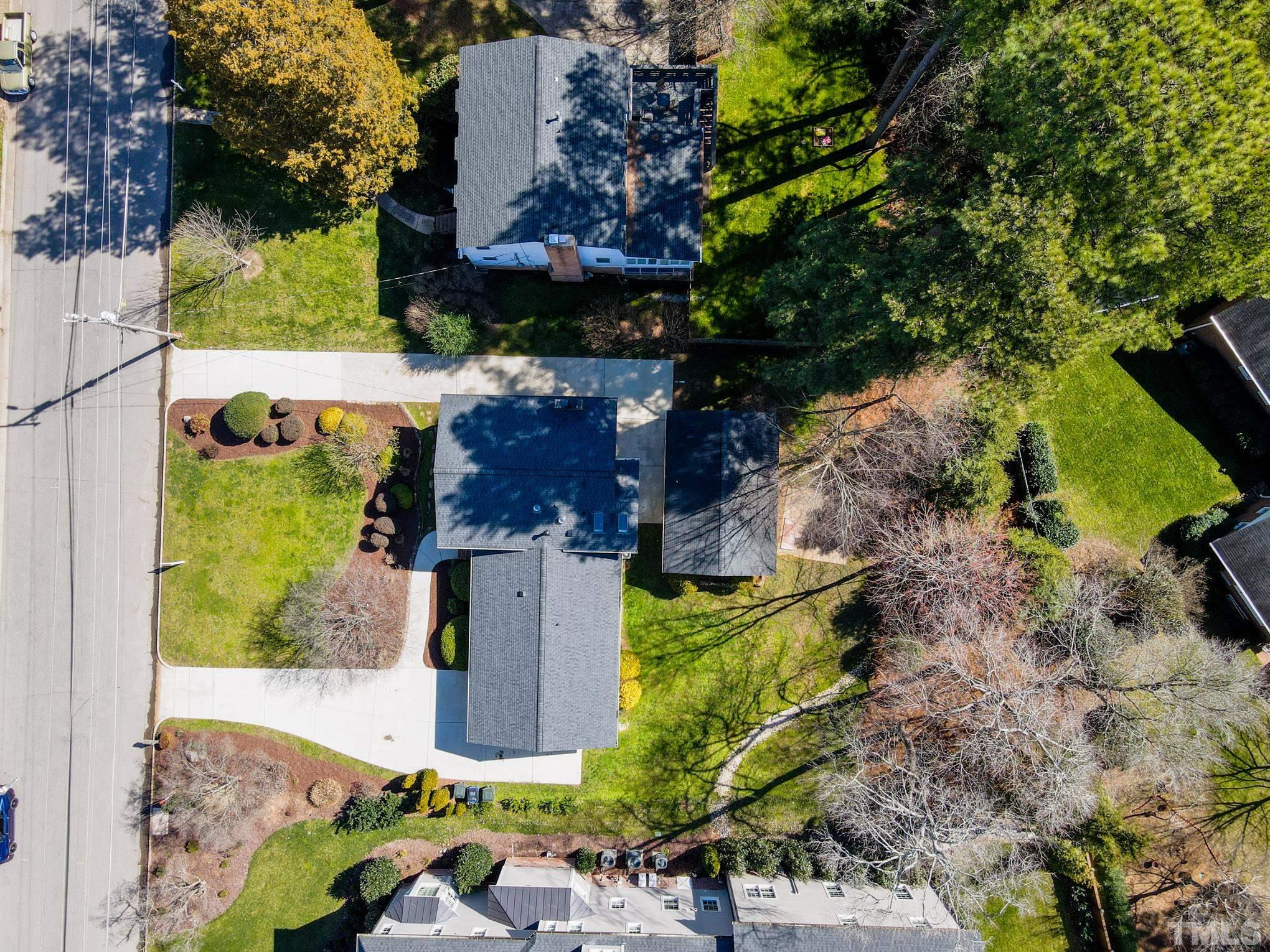 3321 Harden Road Raleigh, NC 27607 - Photo 23 of 26 an aerial view of a house with a yard