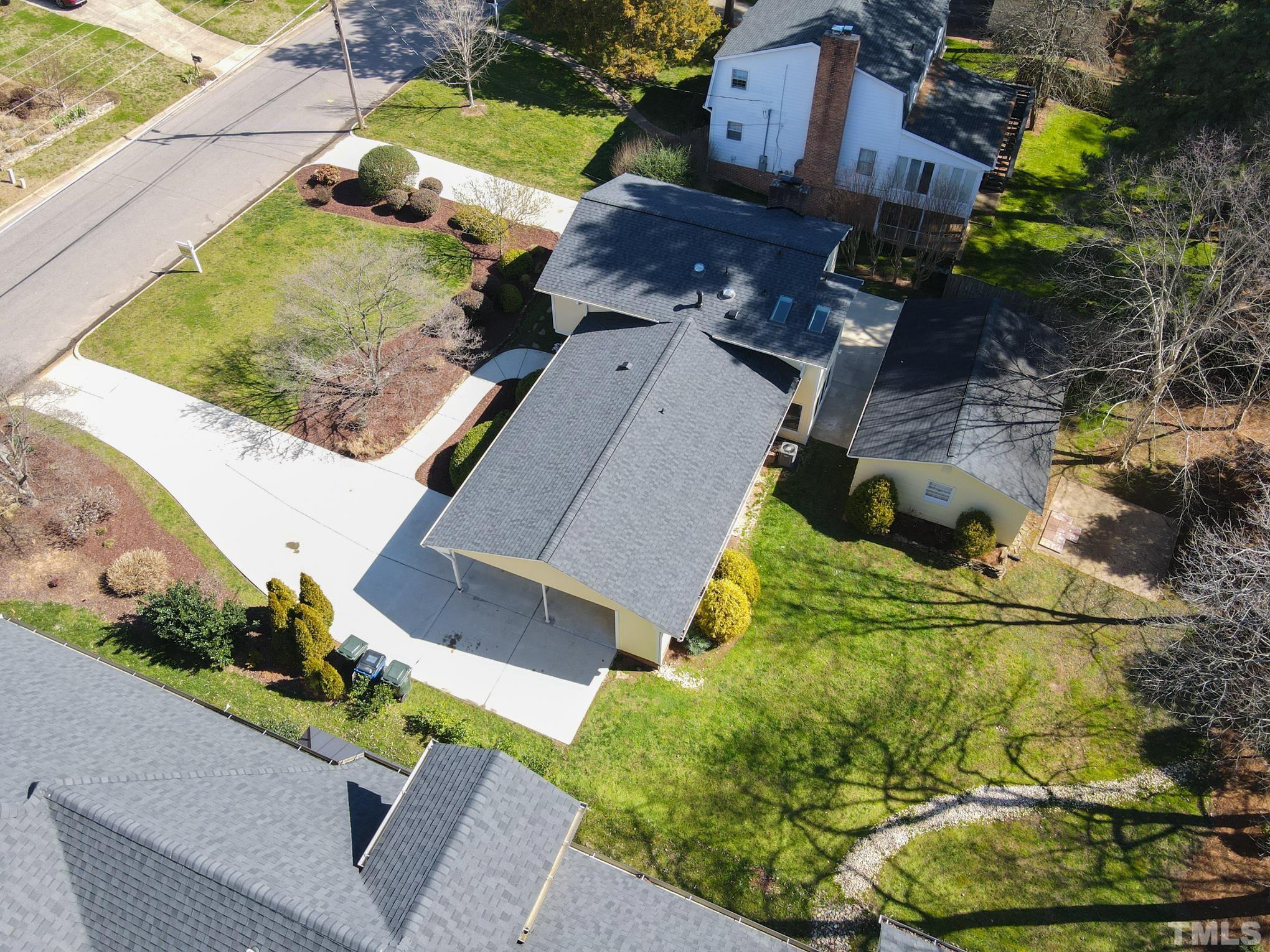 3321 Harden Road Raleigh, NC 27607 - Photo 25 of 26 an aerial view of a house with a yard and potted plants