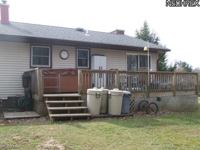 3911 Sandy Ridge Road Southeast Tippecanoe, OH 44699 - Photo 10 of 13 deck with negotialble hot tub