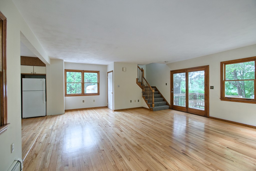 27 Andover Road, Unit 2 Billerica, MA 01821 - Photo 11 of 23 wooden floor in an empty room with a window