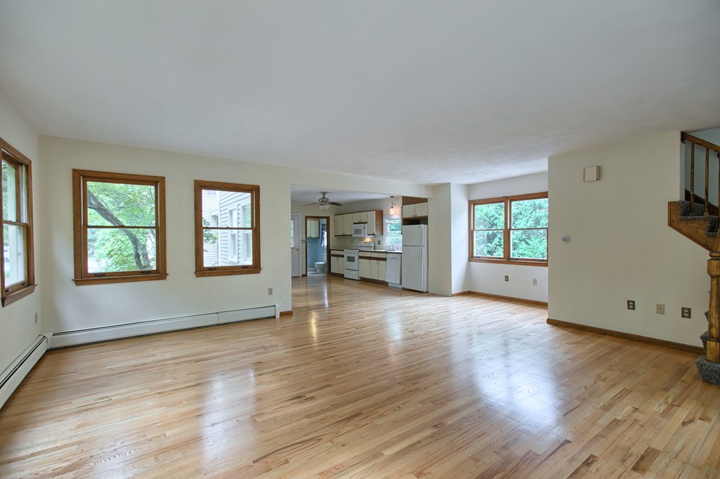 27 Andover Road, Unit 2 Billerica, MA 01821 - Photo 12 of 23 wooden floor in an empty room with a window