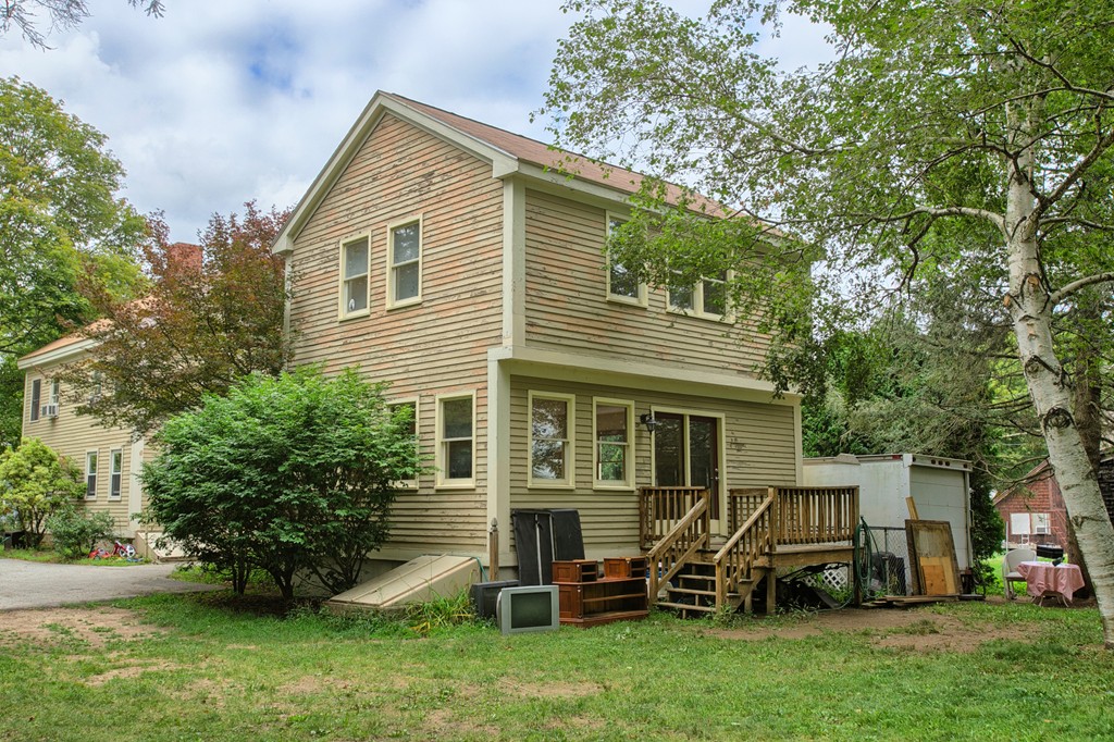 27 Andover Road, Unit 2 Billerica, MA 01821 - Photo 23 of 23 a view of a house with a backyard