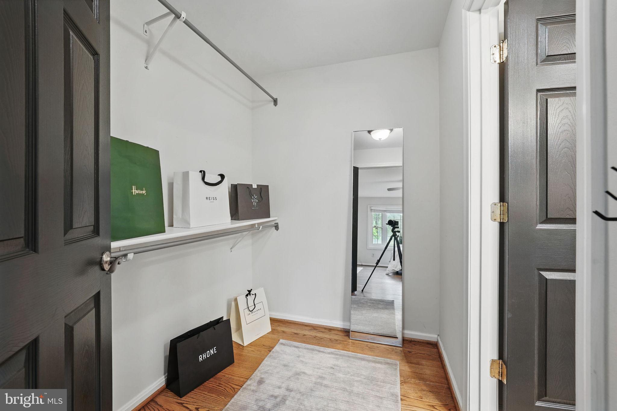 11340 Waples Mill Road Oakton, VA 22124 - Photo 12 of 34 a view of a livingroom with a fireplace and entryway