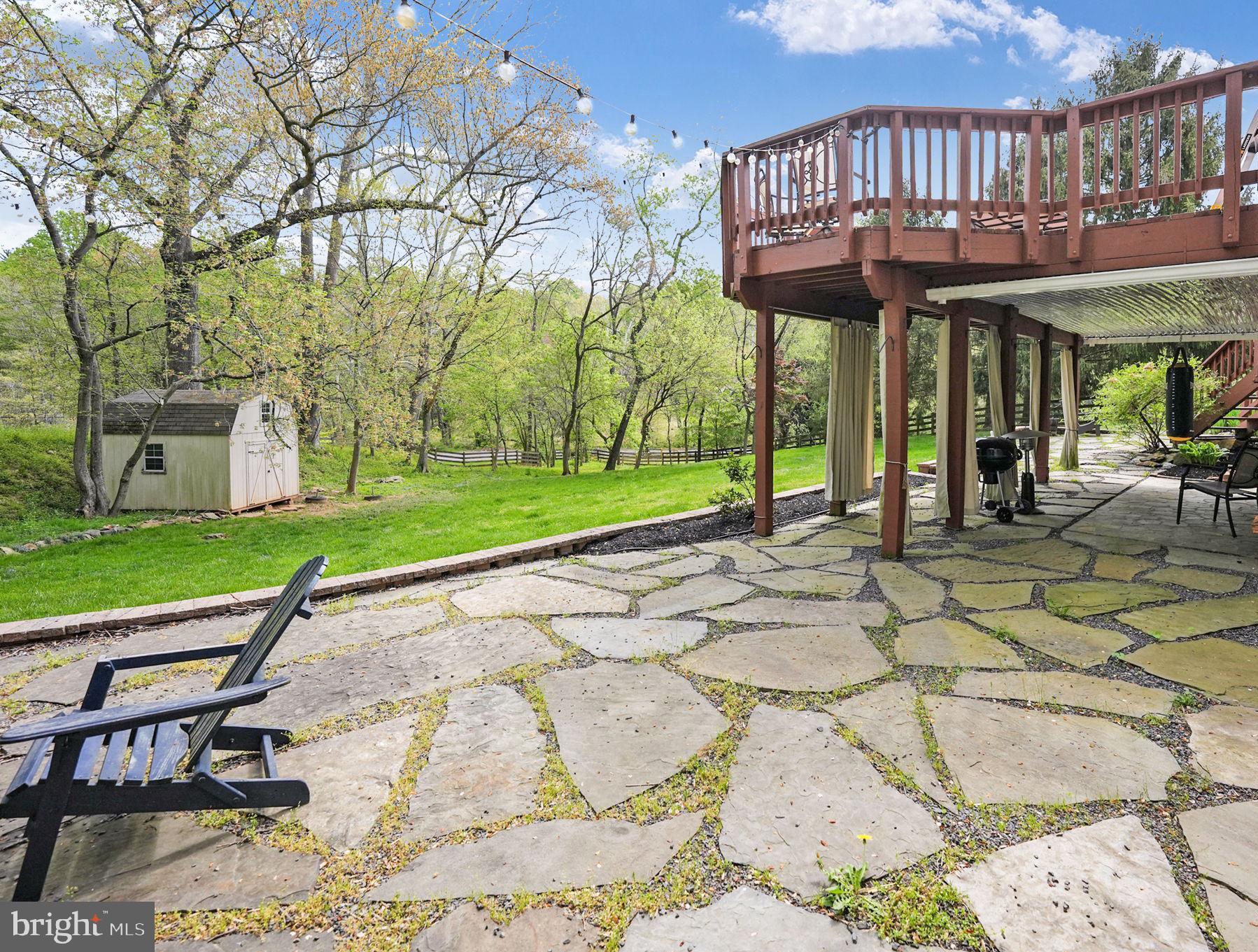 11340 Waples Mill Road Oakton, VA 22124 - Photo 26 of 34 a view of a chairs and table in the patio