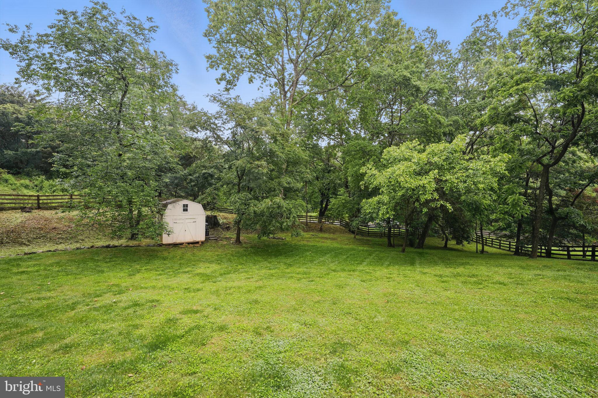 11340 Waples Mill Road Oakton, VA 22124 - Photo 31 of 34 a view of a trees with a bench