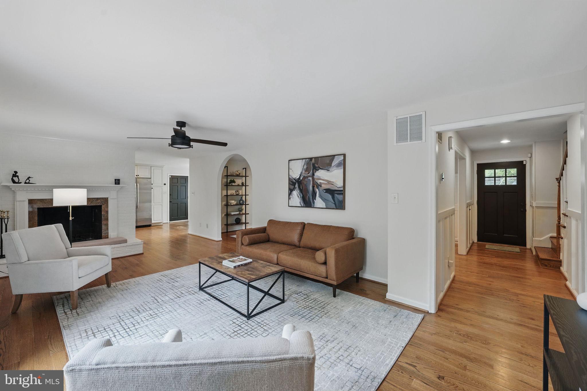 11340 Waples Mill Road Oakton, VA 22124 - Photo 4 of 34 a living room with furniture and a wooden floor