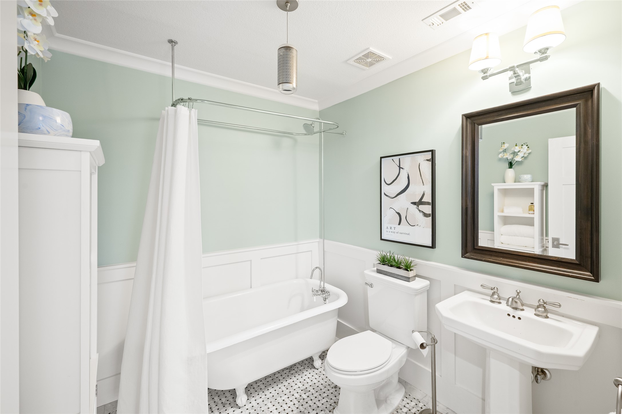 714 Wilken Street Houston, TX 77008 - Photo 14 of 35 a bathroom with a bathtub shower sink mirror vanity and toilet