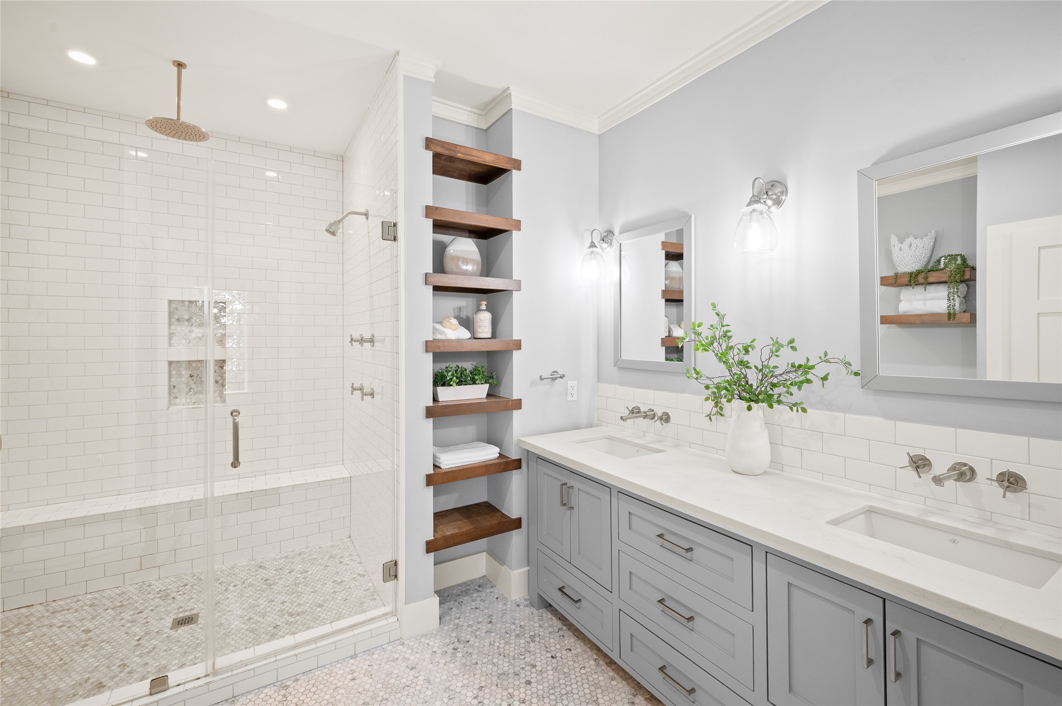 714 Wilken Street Houston, TX 77008 - Photo 19 of 35 a spacious bathroom with a shower sink and mirror