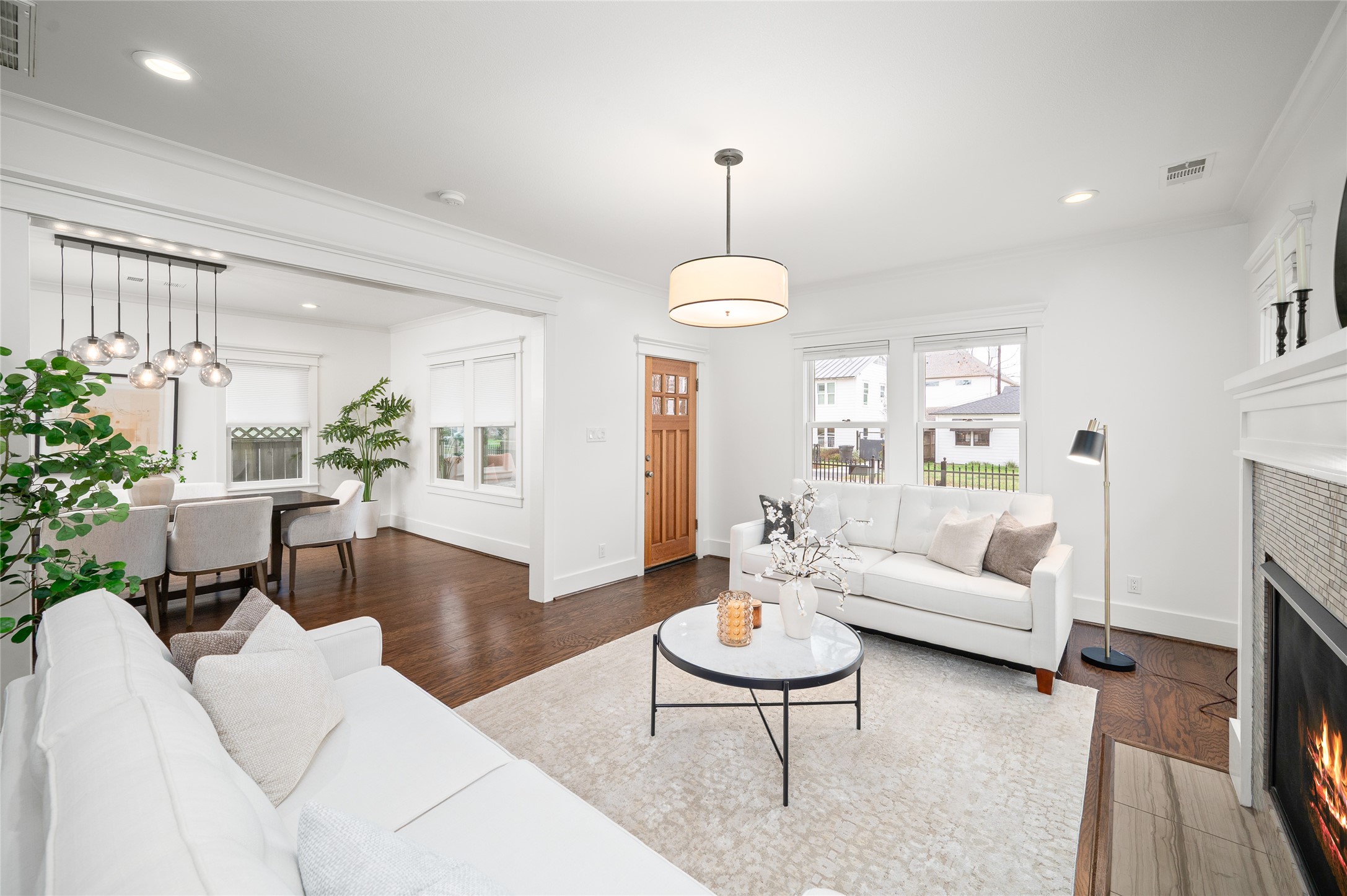 714 Wilken Street Houston, TX 77008 - Photo 6 of 35 a living room with furniture a table and a potted plant