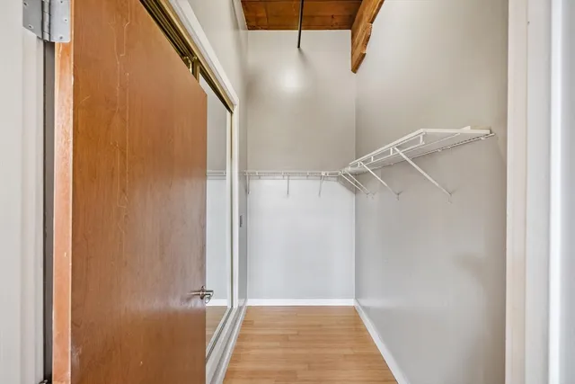 a view of a room with racks on the wall