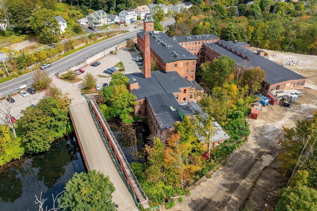 1511 Main Street, Unit C306 Worcester, MA 01603 - Photo 26 of 33 an aerial view of house with yard