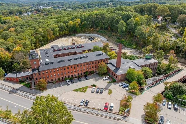 an aerial view of a swimming pool patio and mountain view