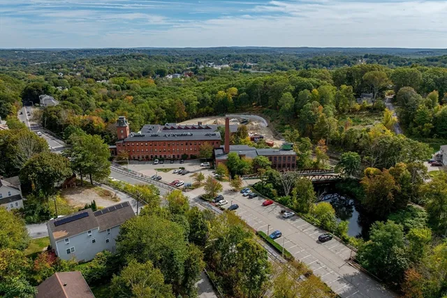 an aerial view of a house with a garden