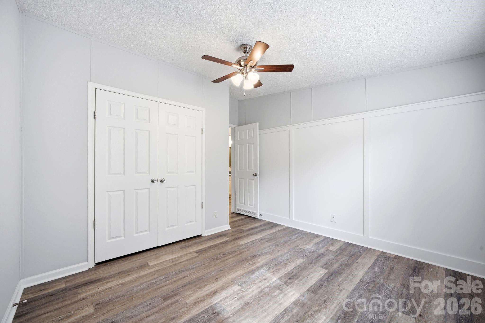 2368 Beth Haven Church Road Denver, NC 28037 - Photo 19 of 42 a view of empty room with wooden floor