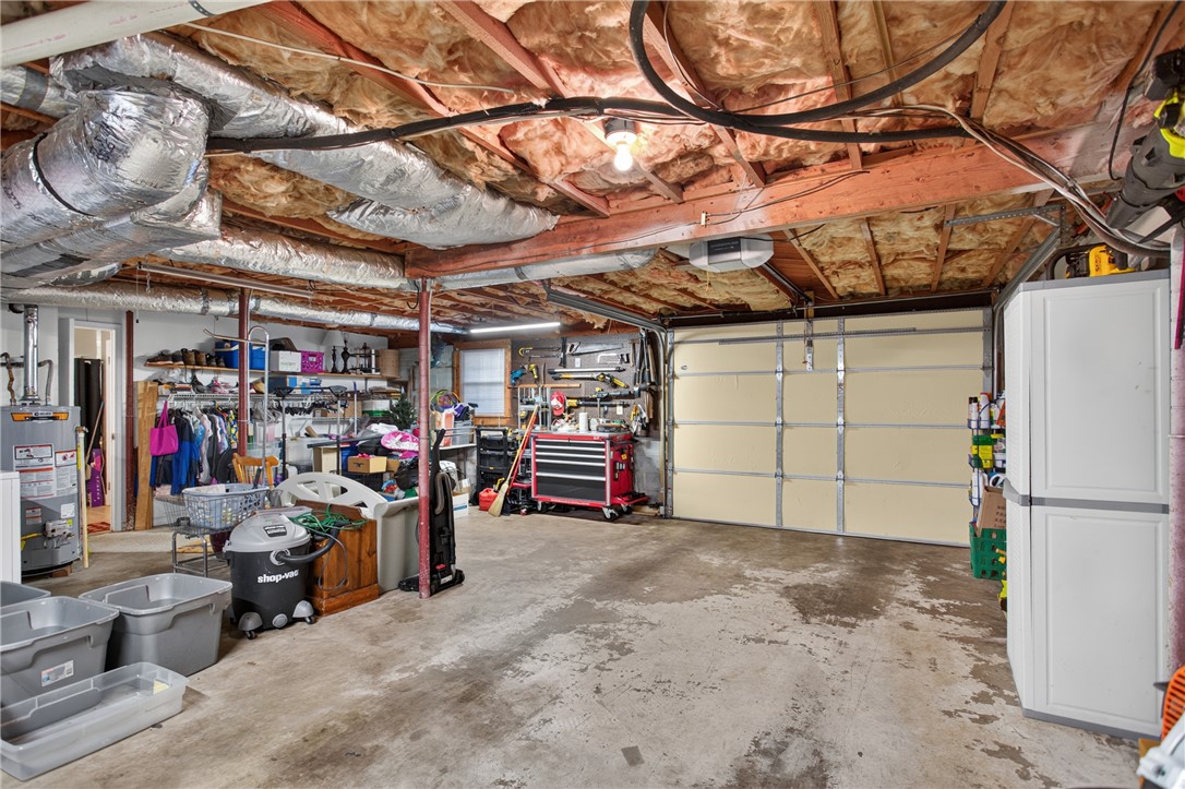 104 Laurel Lane Seneca, SC 29678 - Photo 27 of 36 Ample space for parking and storage in this adaptable garage.