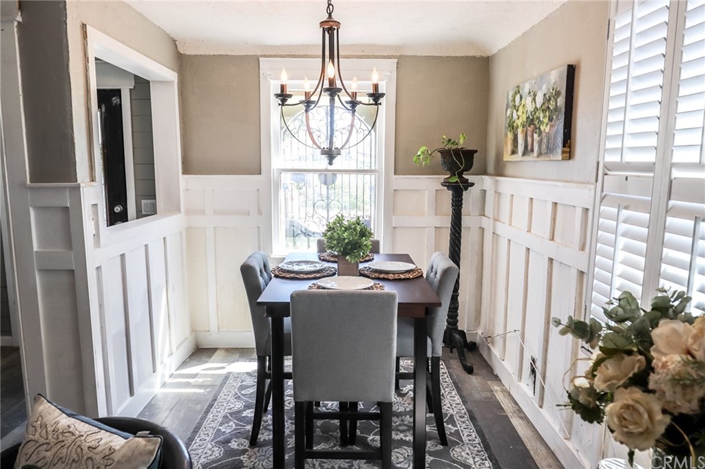 304 C Street Needles, CA 92363 - Photo 14 of 57 a view of a dining room with furniture window and wooden floor